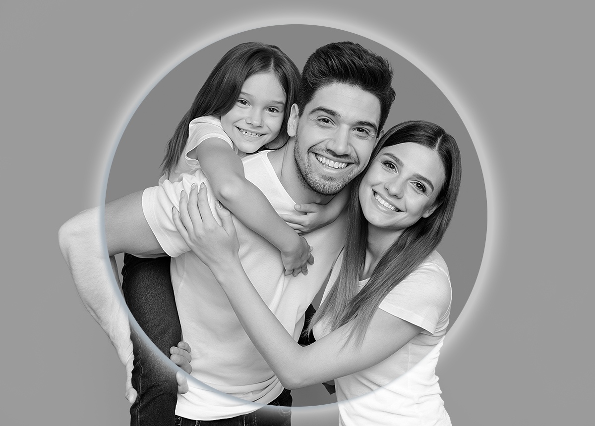 Joyful and beautiful young family with a child