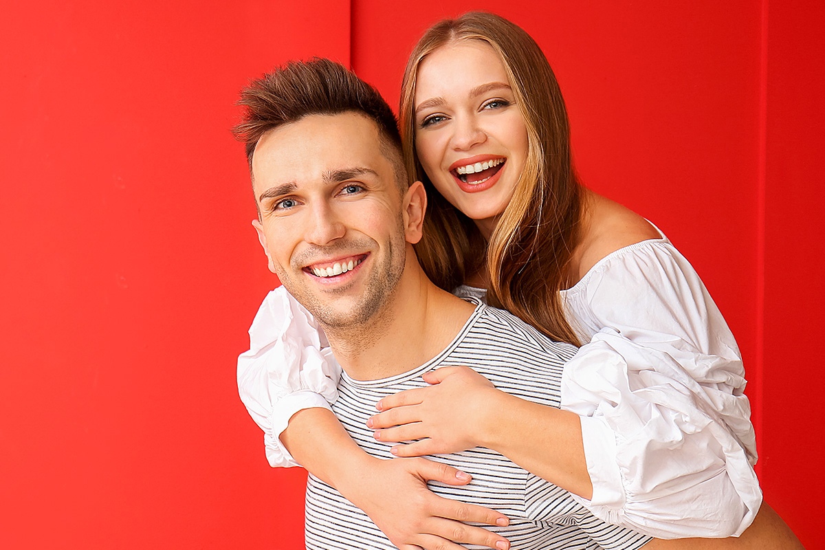 Image of a cute couple with smiles on their faces
