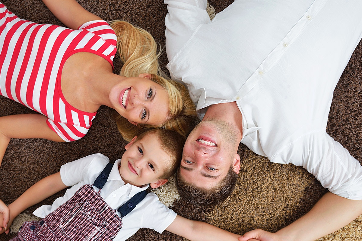 Image of a happy couple with a baby