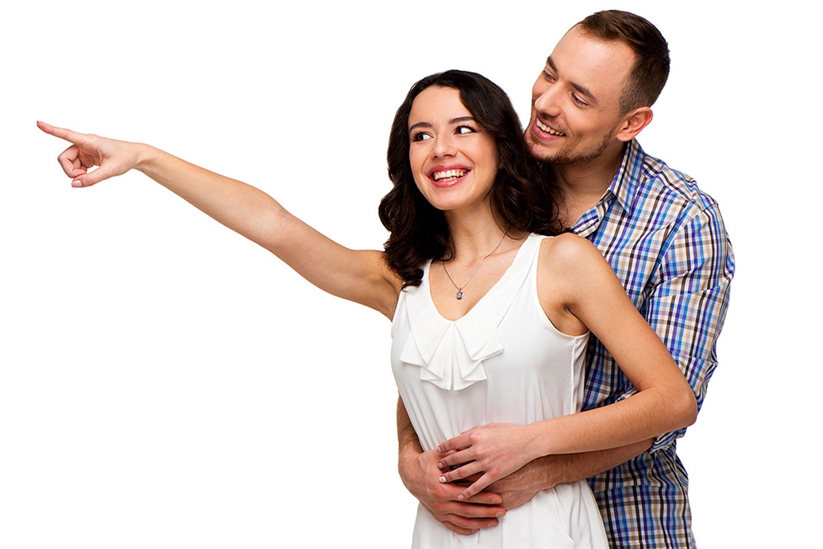 Image of a couple pointing into the distance