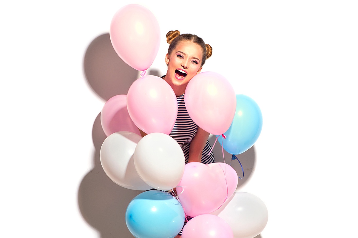 Image of a girl with balloons