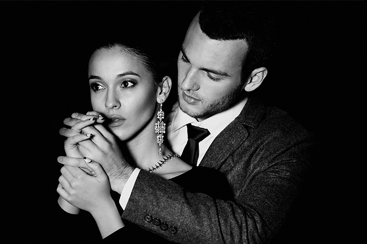 Black and white photo of a couple hugging