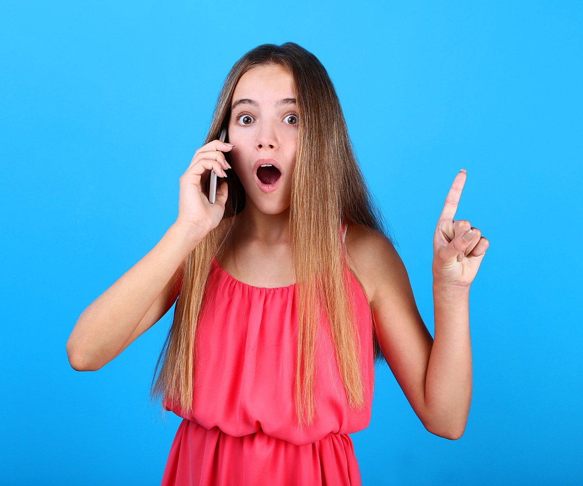 Image of anxious girl with phone