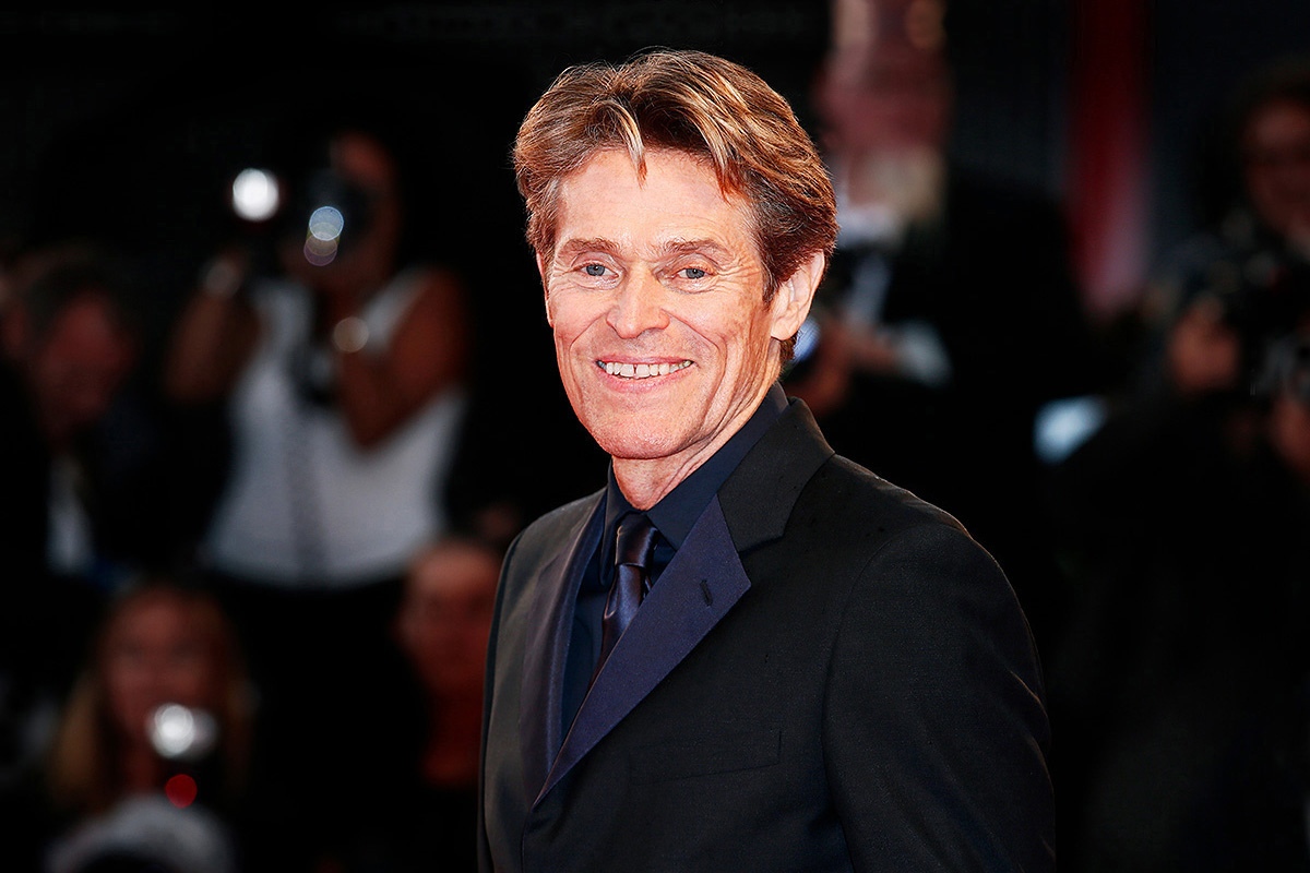 Image of American actor Willem Dafoe in a beautiful suit
