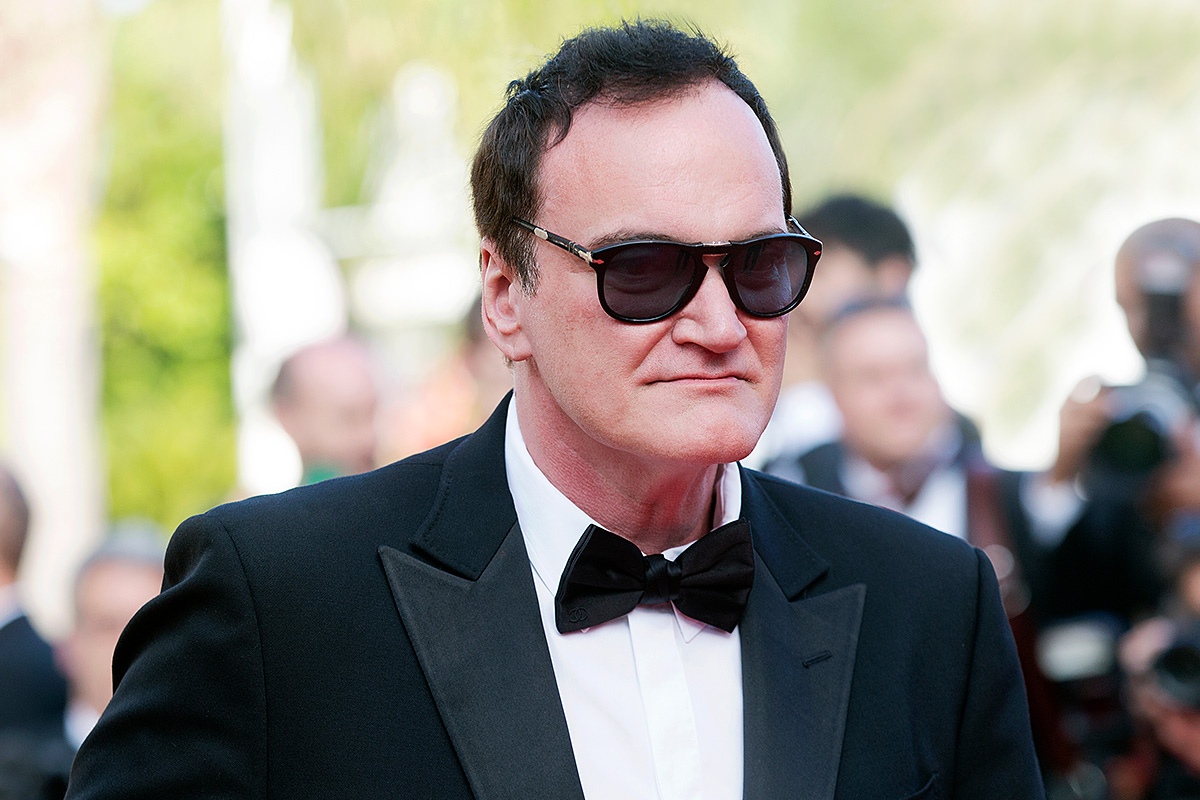 Image of Quentin Tarantino in suit and sunglasses