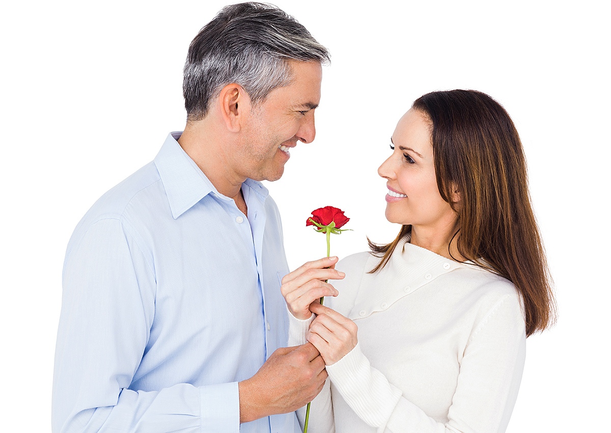 Man giving flowers to beautiful girl