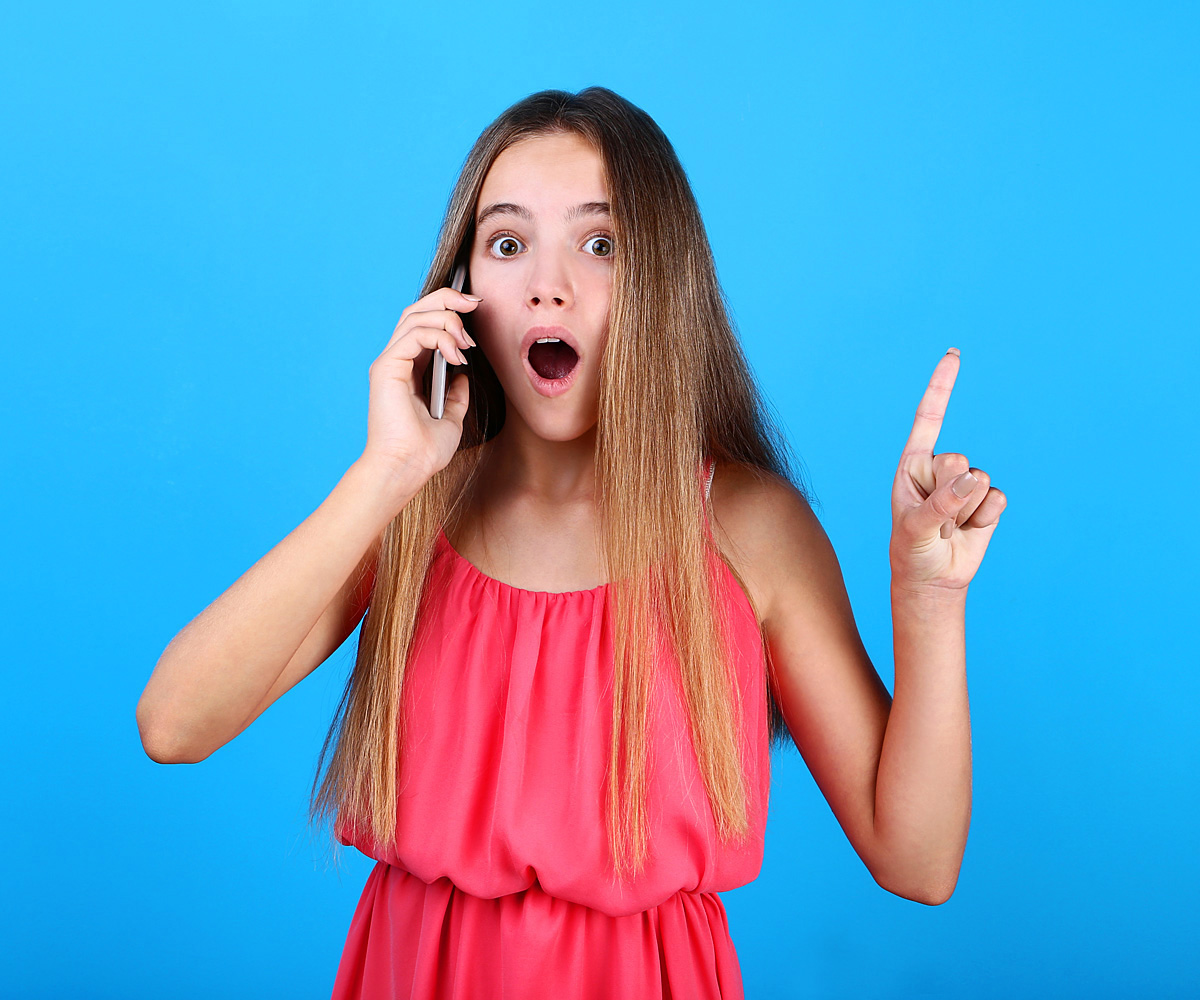 Girl anxious talking on the mobile phone
