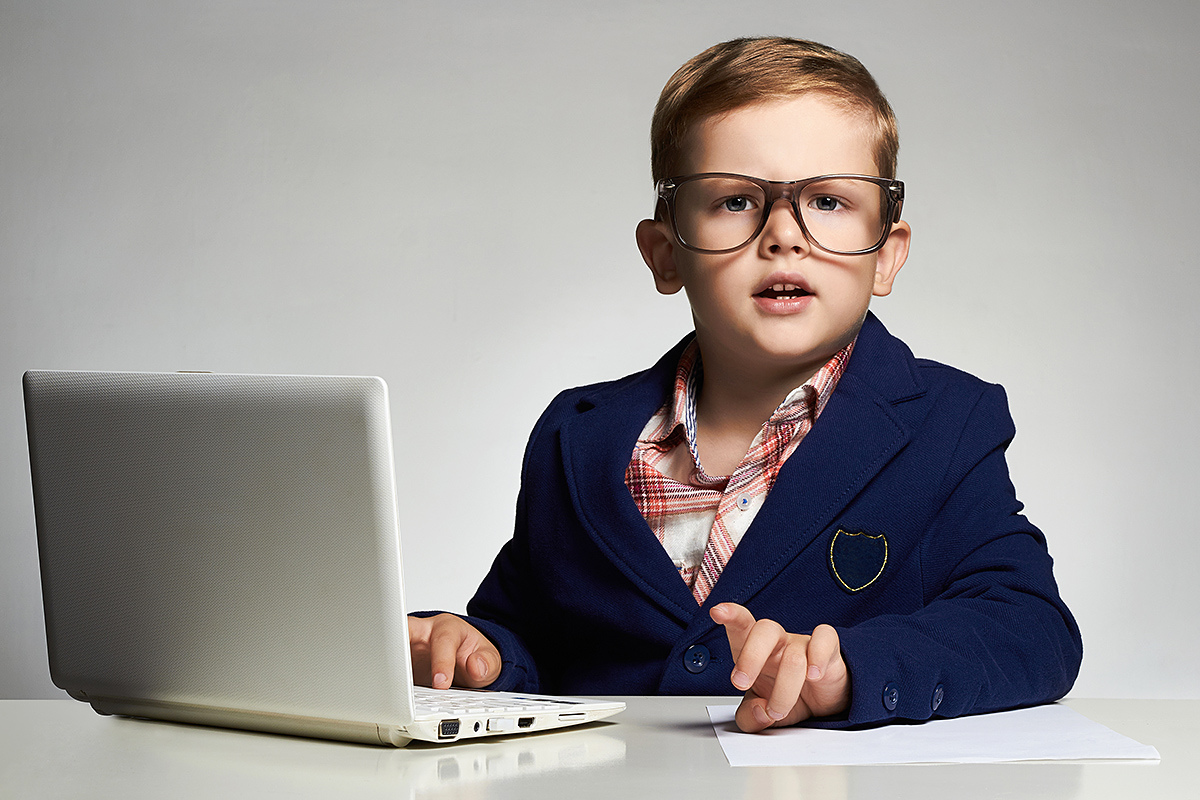 Image of a smart child with a laptop
