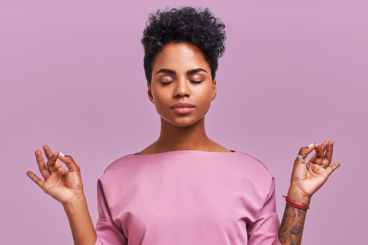 Image of a meditating woman after a conflict with a man
