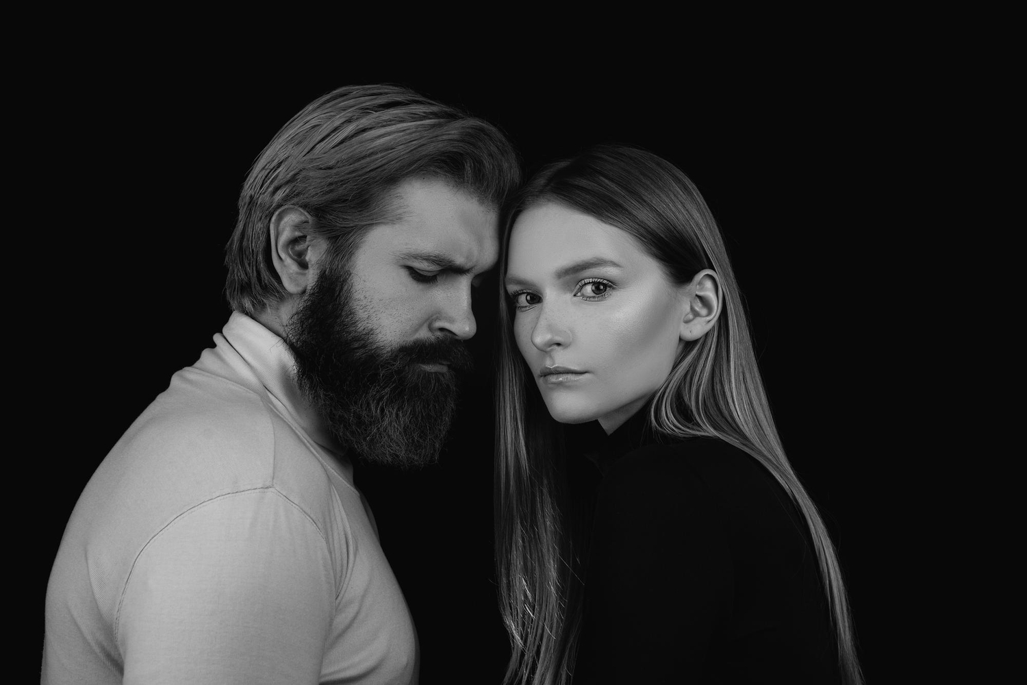 The composition evokes themes of connection, intimacy, trust, and emotional depth between the two subjects. The composition evokes themes of connection, intimacy, trust, and emotional depth between the two subjects.