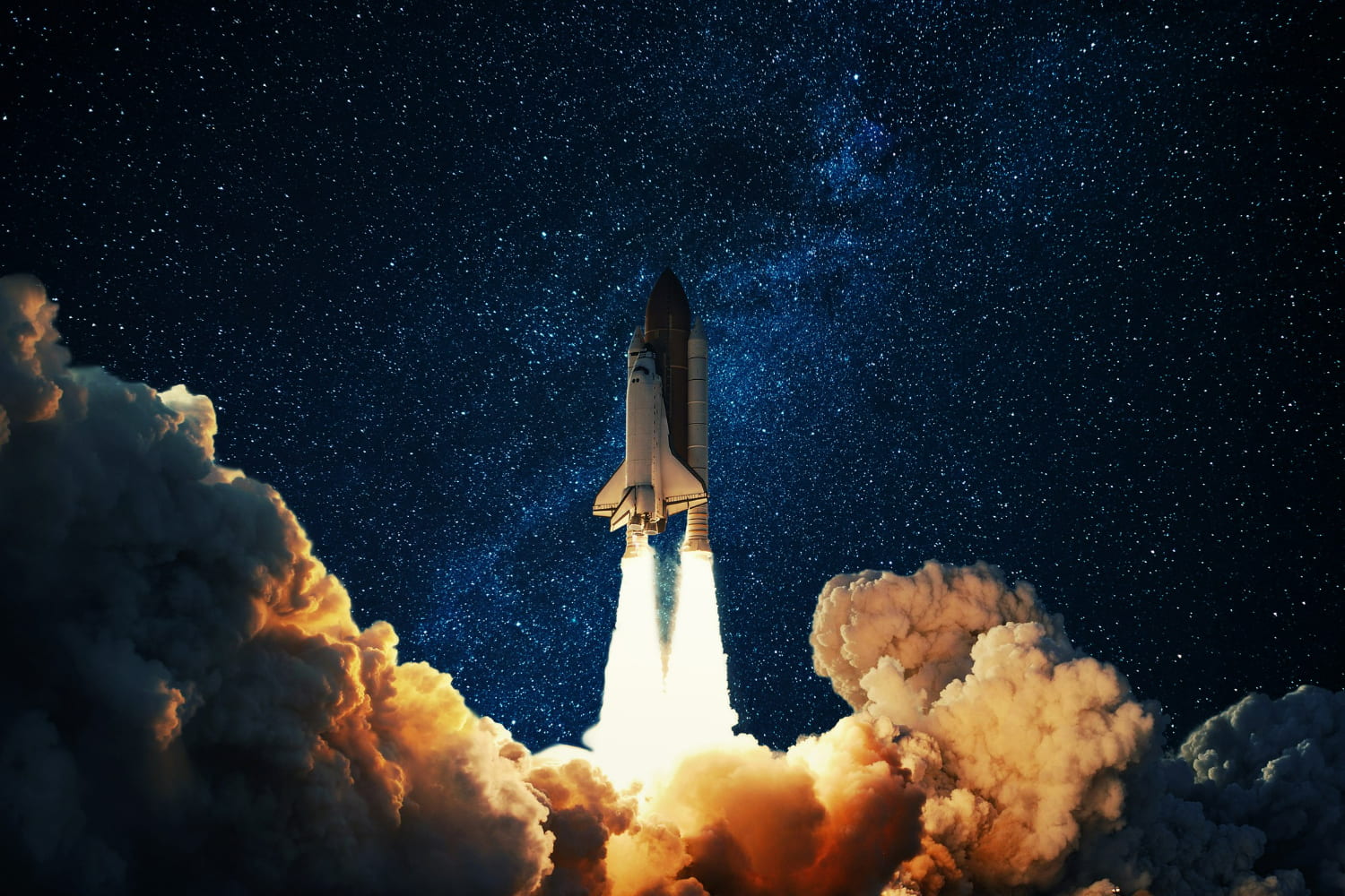 The shuttle rises majestically through massive billows of golden-orange smoke and vapor, generated by its powerful solid rocket boosters and main engines.