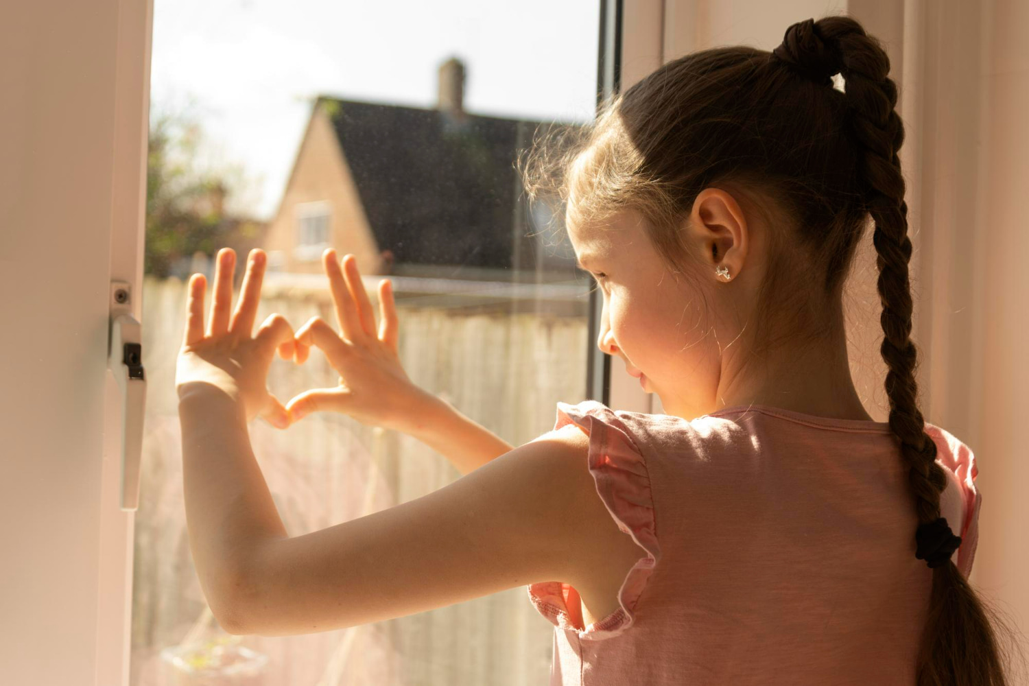 This heartwarming photograph captures a tender moment of childhood innocence and optimism.